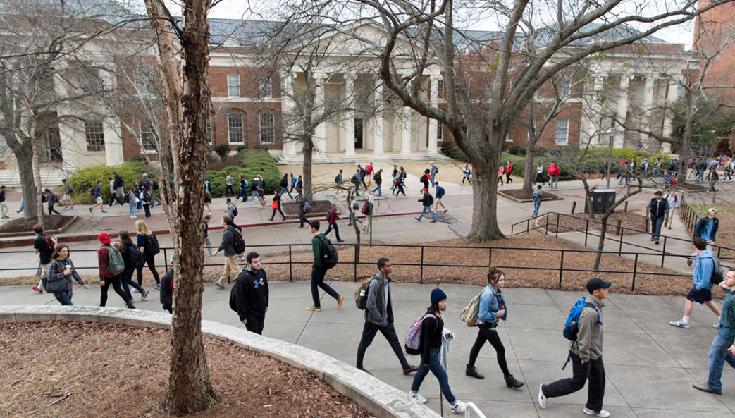 Students outside of Brooks Hall, which houses the Department of Statistics.